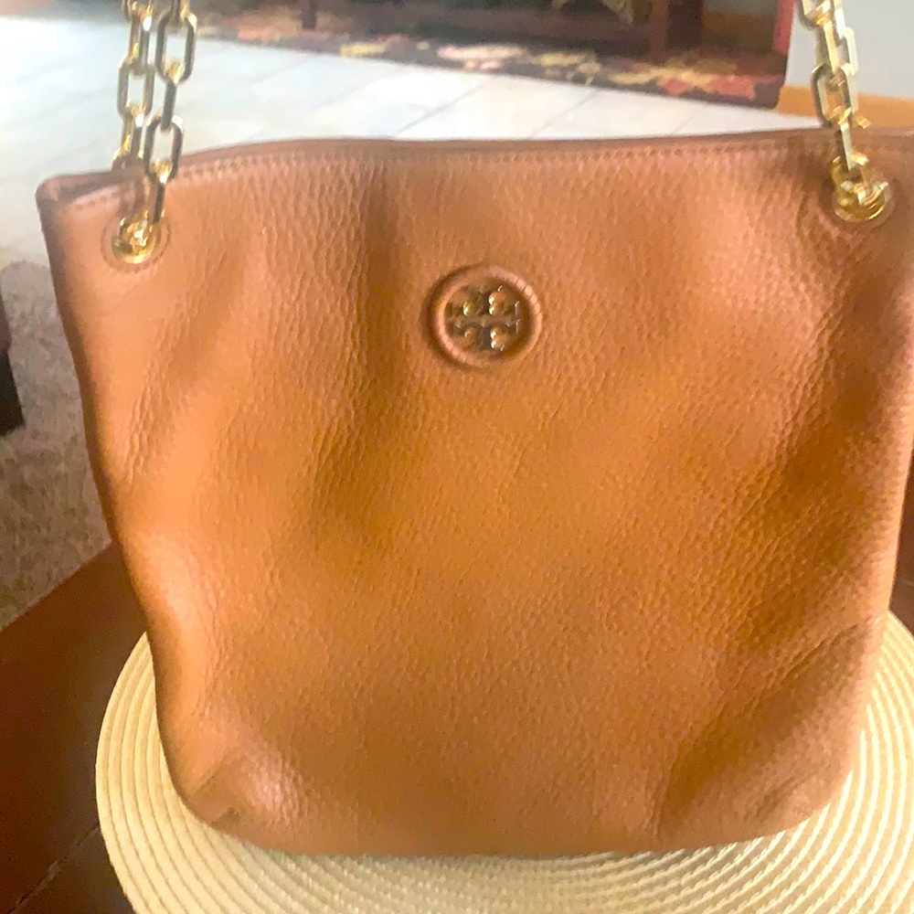 Tory Burch flat neutral versatile purse. Used once. Perfect condition